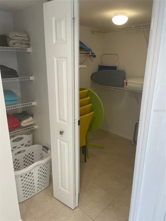 1 Key Capri, Unit 104W Treasure Island, FL 33706 - Photo 24 of 49 a bathroom with a shower