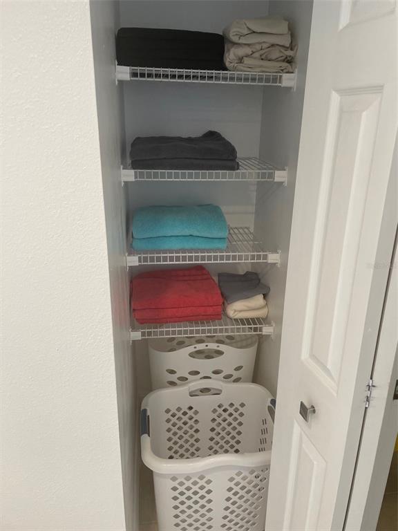 1 Key Capri, Unit 104W Treasure Island, FL 33706 - Photo 25 of 49 a close view of cabinet