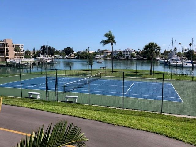 1 Key Capri, Unit 104W Treasure Island, FL 33706 - Photo 43 of 49 a view of a tennis court