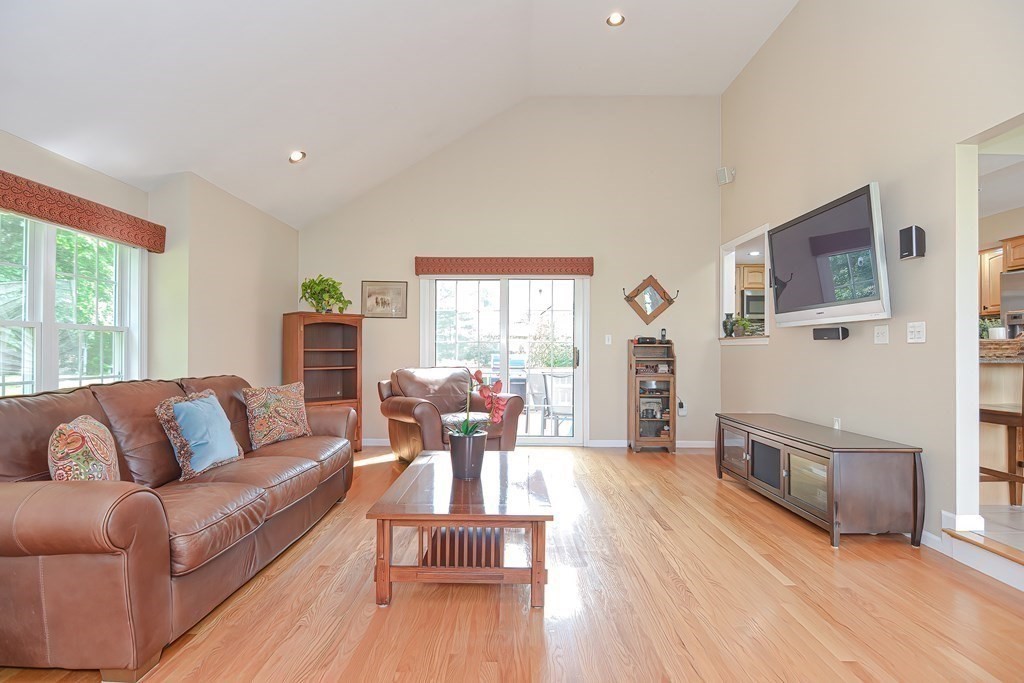 38 Pennock Road Ashland, MA 01721 - Photo 16 of 40 a living room with furniture and a fireplace