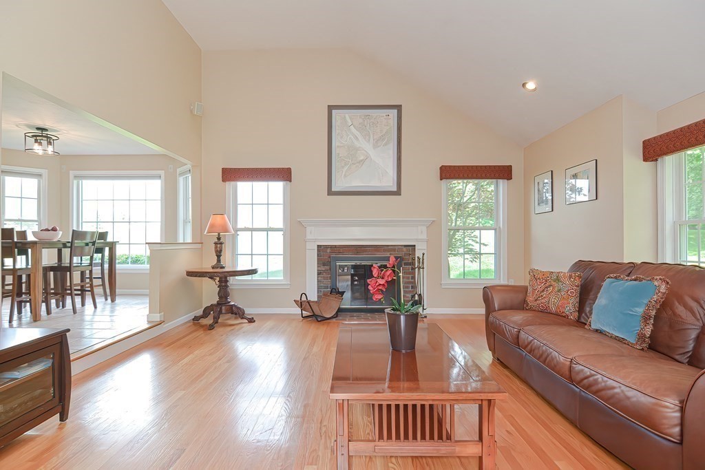38 Pennock Road Ashland, MA 01721 - Photo 19 of 40 a living room with furniture fireplace and a table