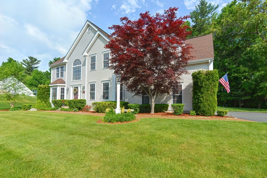 38 Pennock Road Ashland, MA 01721 - Photo 2 of 40 a front view of a house with a yard