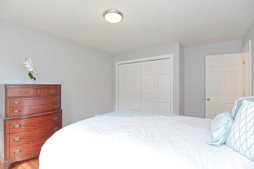 38 Pennock Road Ashland, MA 01721 - Photo 21 of 40 a bedroom with a bed and a dresser