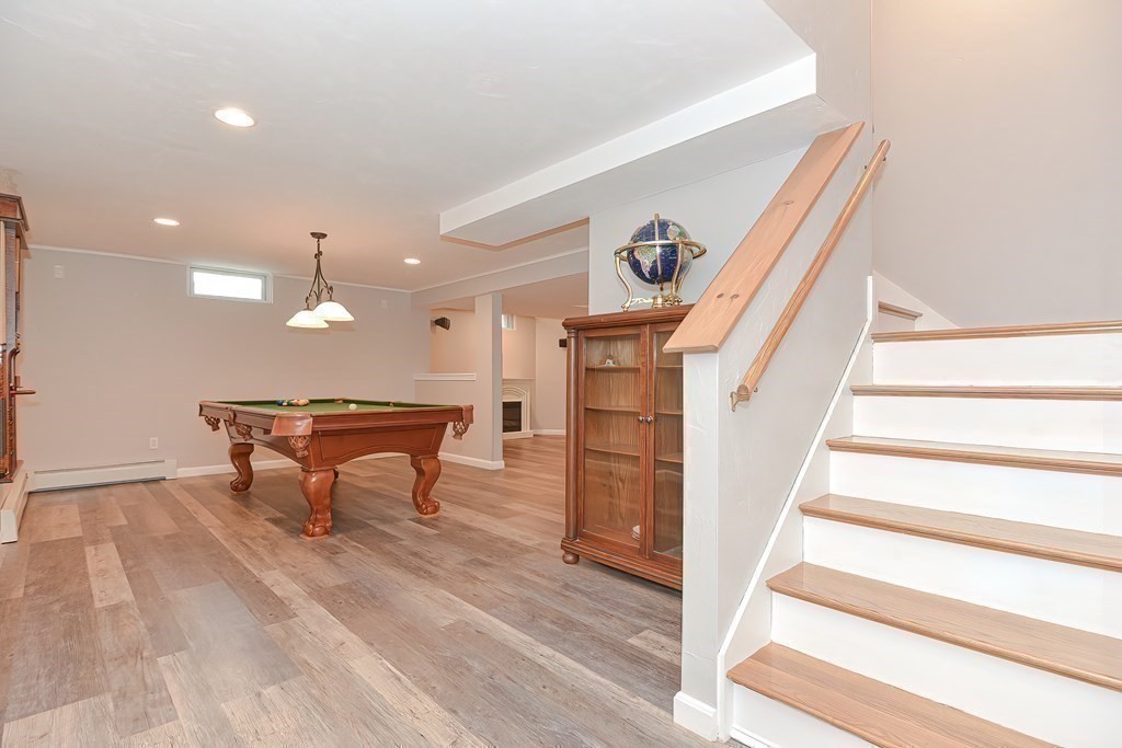 38 Pennock Road Ashland, MA 01721 - Photo 31 of 40 a room with stairs and a furniture