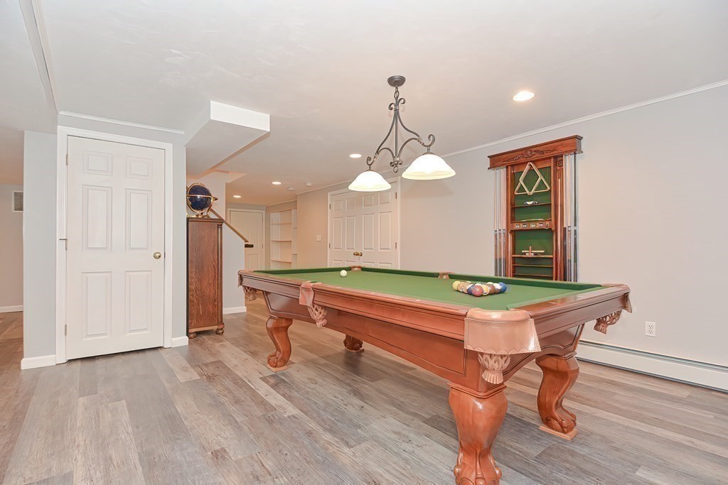 38 Pennock Road Ashland, MA 01721 - Photo 32 of 40 a room with wooden floor pool table and windows