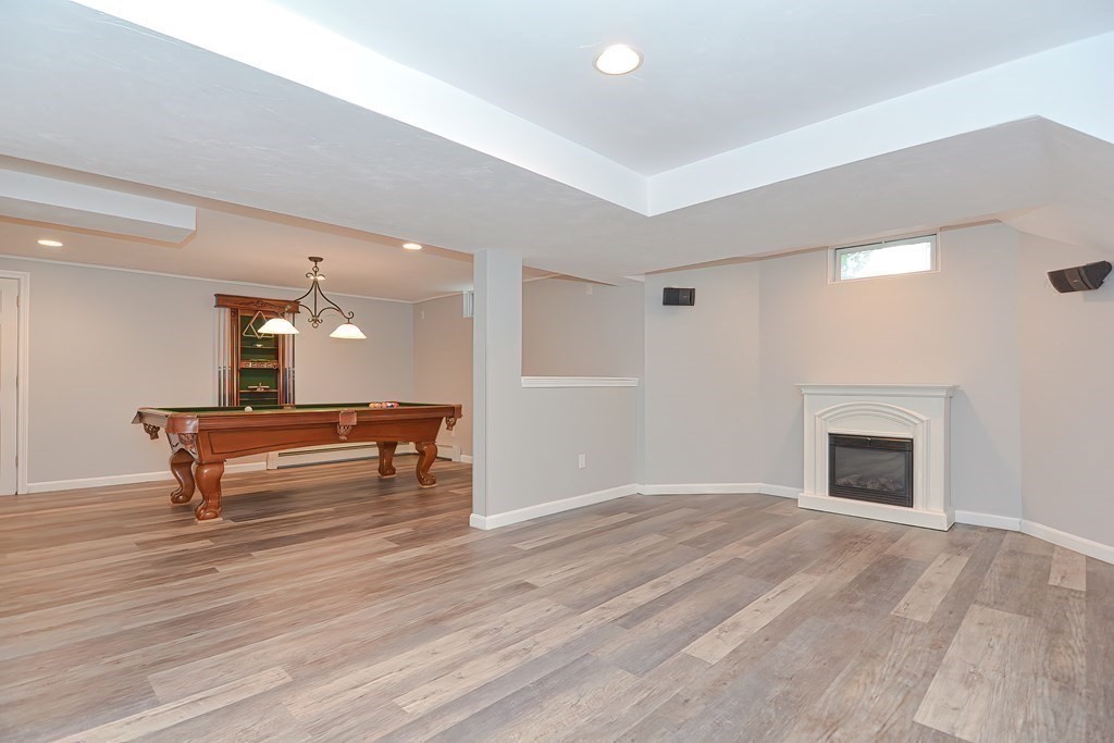 38 Pennock Road Ashland, MA 01721 - Photo 33 of 40 a room with wooden floor and furniture