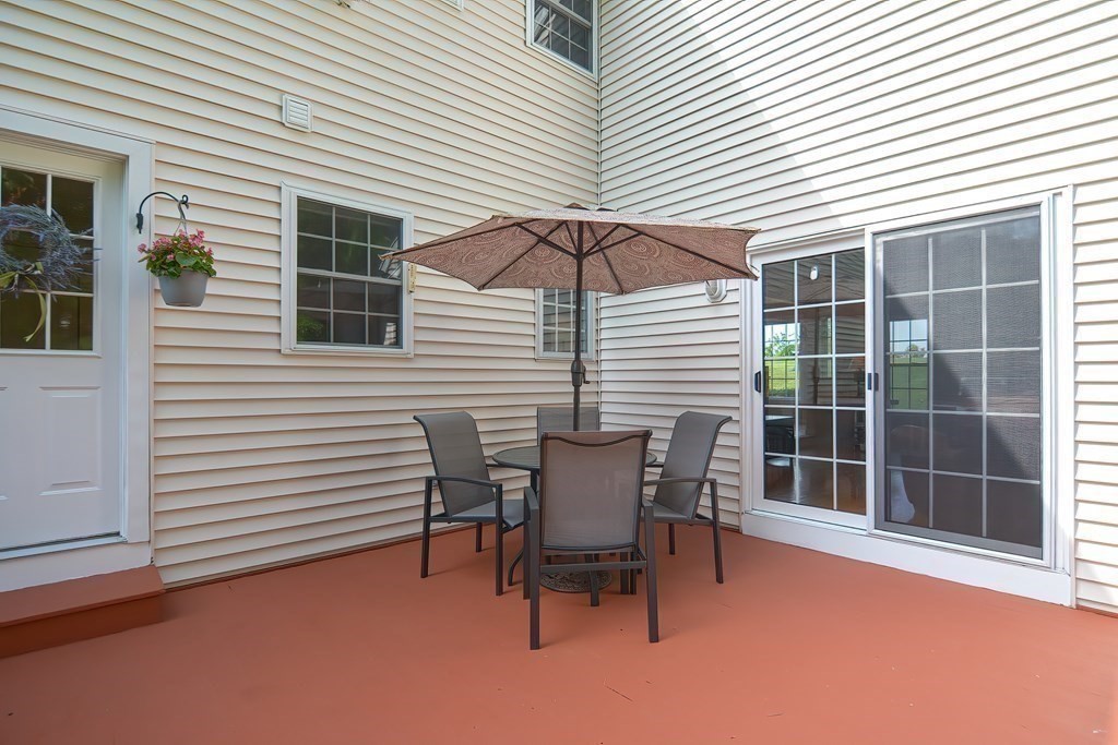38 Pennock Road Ashland, MA 01721 - Photo 36 of 40 a view of a house with backyard and sitting area