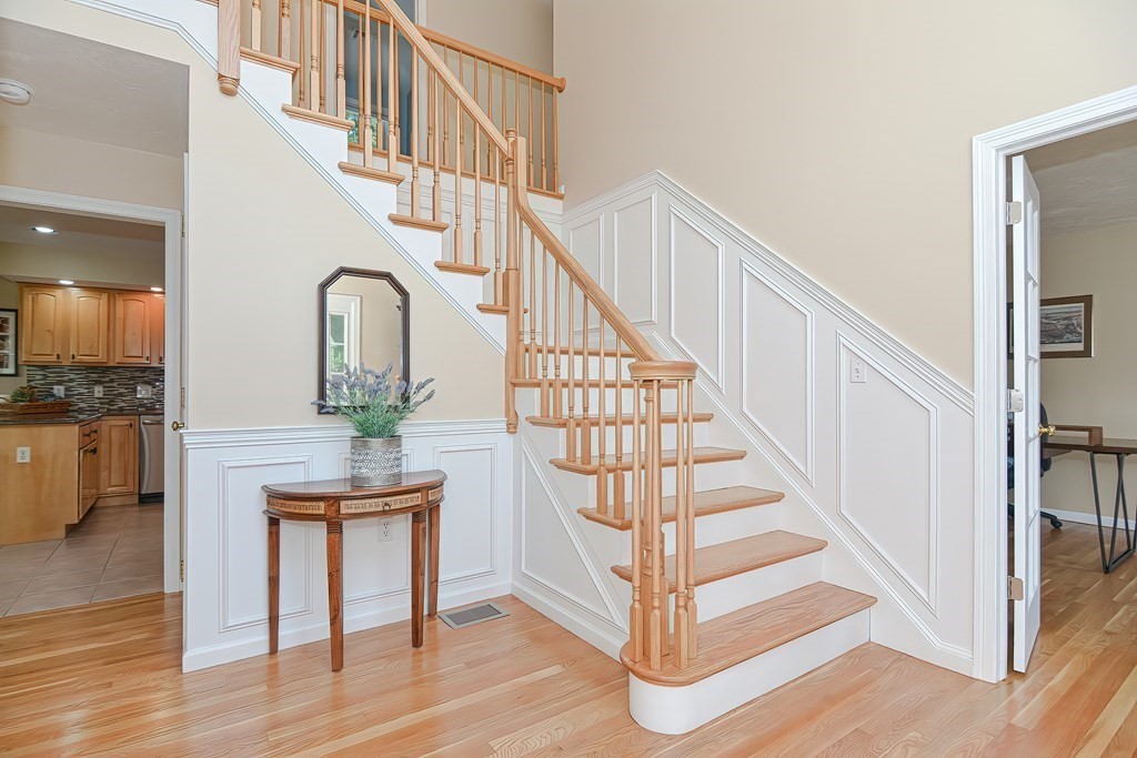 38 Pennock Road Ashland, MA 01721 - Photo 6 of 40 a view of entryway and hall with wooden floor