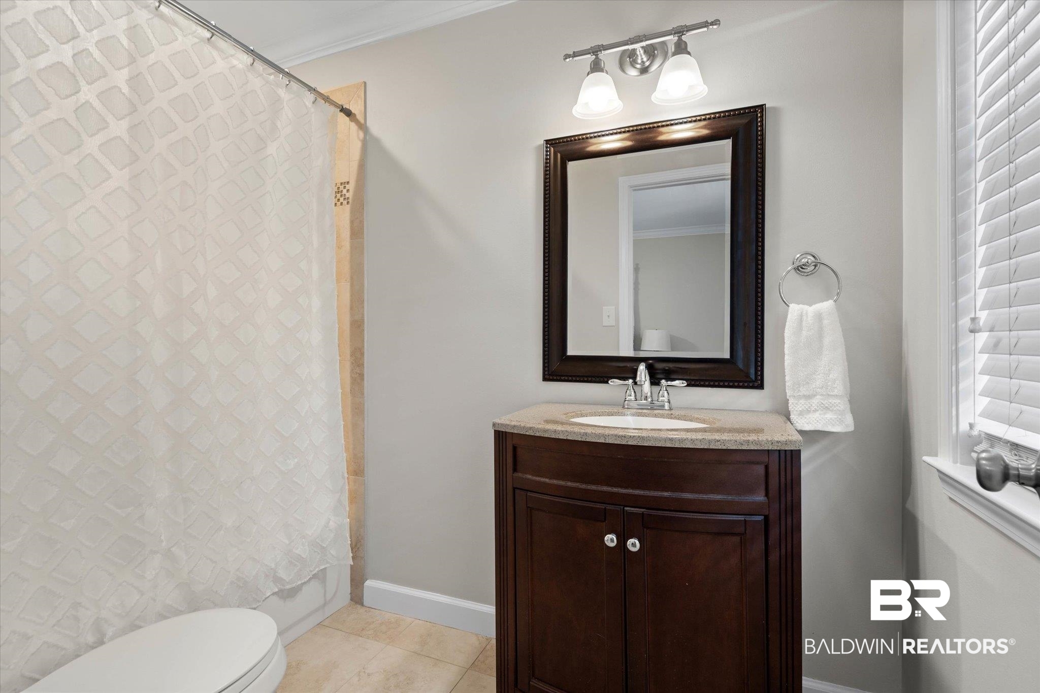 3715 Latigo Road Mobile, AL 36695 - Photo 17 of 39 Full bathroom featuring toilet, vanity, baseboards, shower / bath combination with curtain, and tile patterned floors