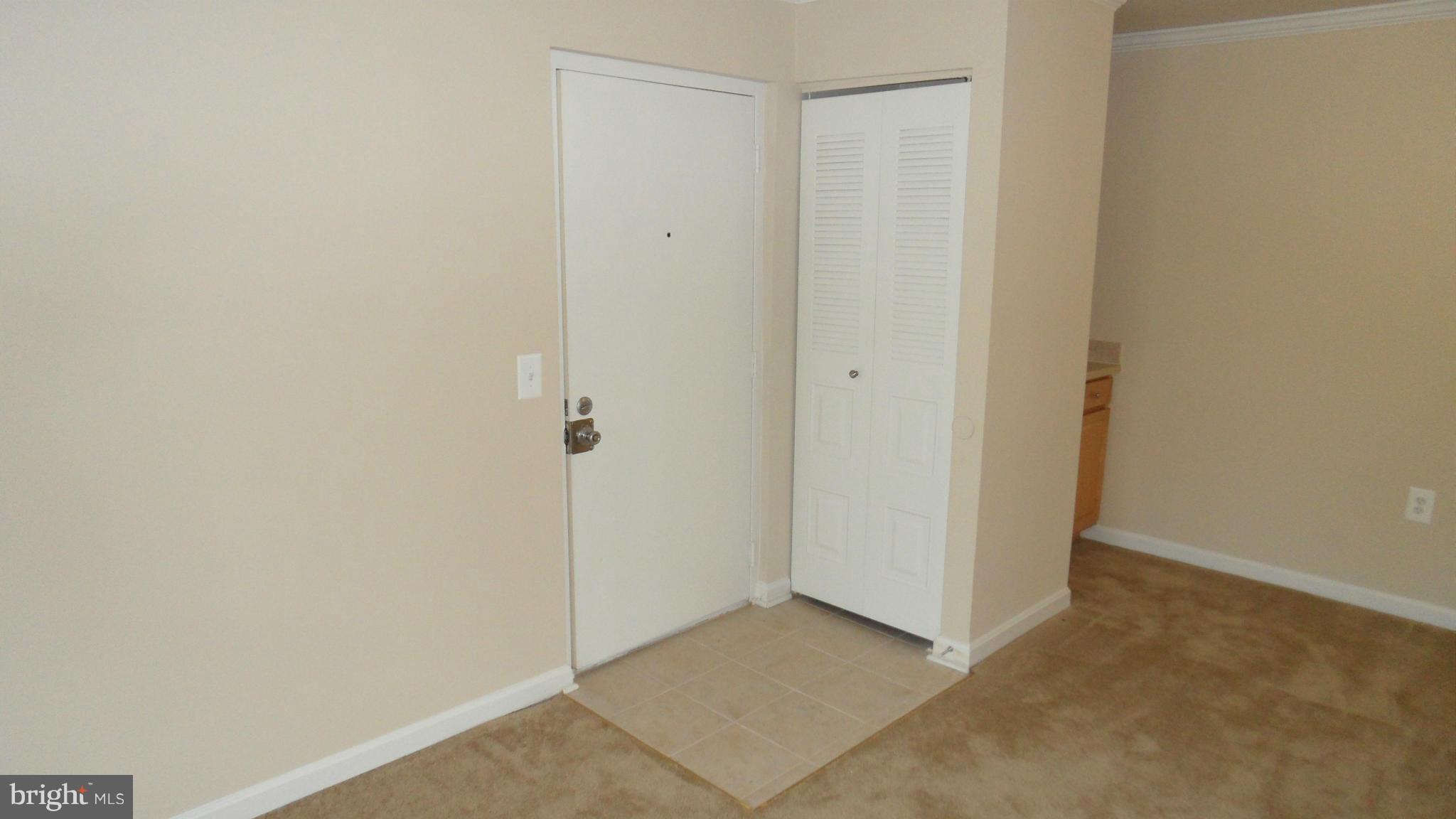 18318 Streamside Drive, Unit 304 Gaithersburg, MD 20879 - Photo 3 of 30 a view of an empty room