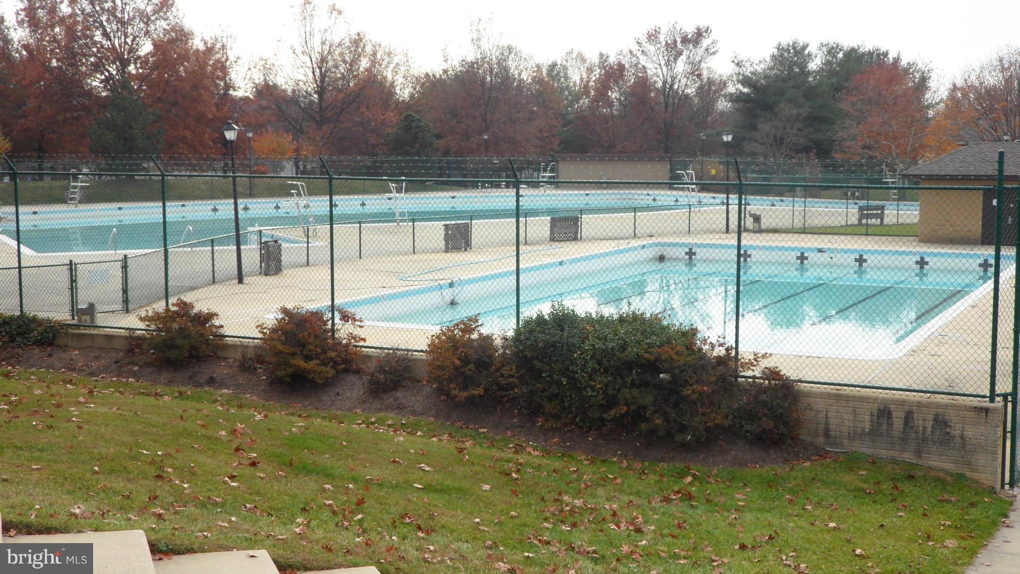 18318 Streamside Drive, Unit 304 Gaithersburg, MD 20879 - Photo 24 of 30 a view of a backyard