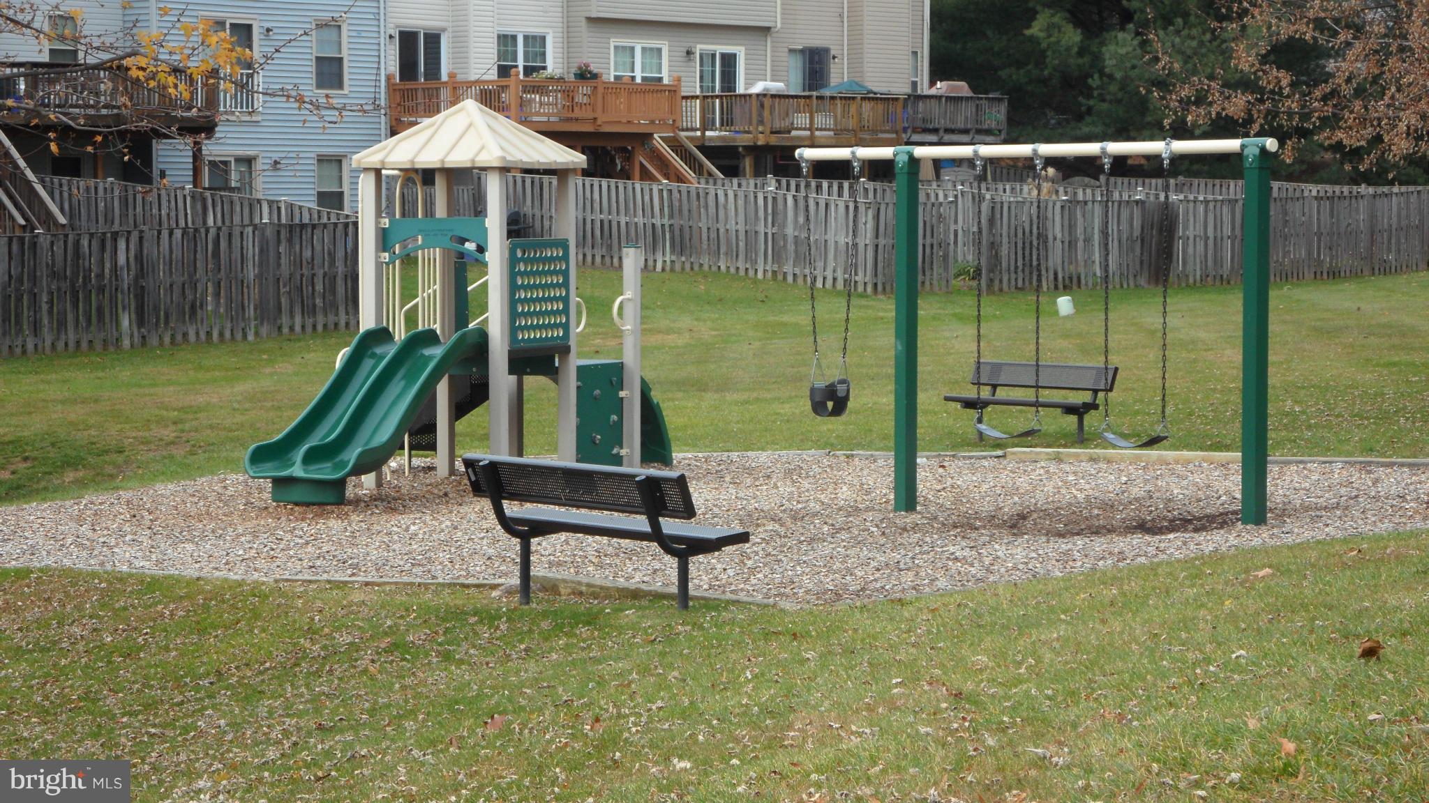 18318 Streamside Drive, Unit 304 Gaithersburg, MD 20879 - Photo 27 of 30 a garden view with a seating space