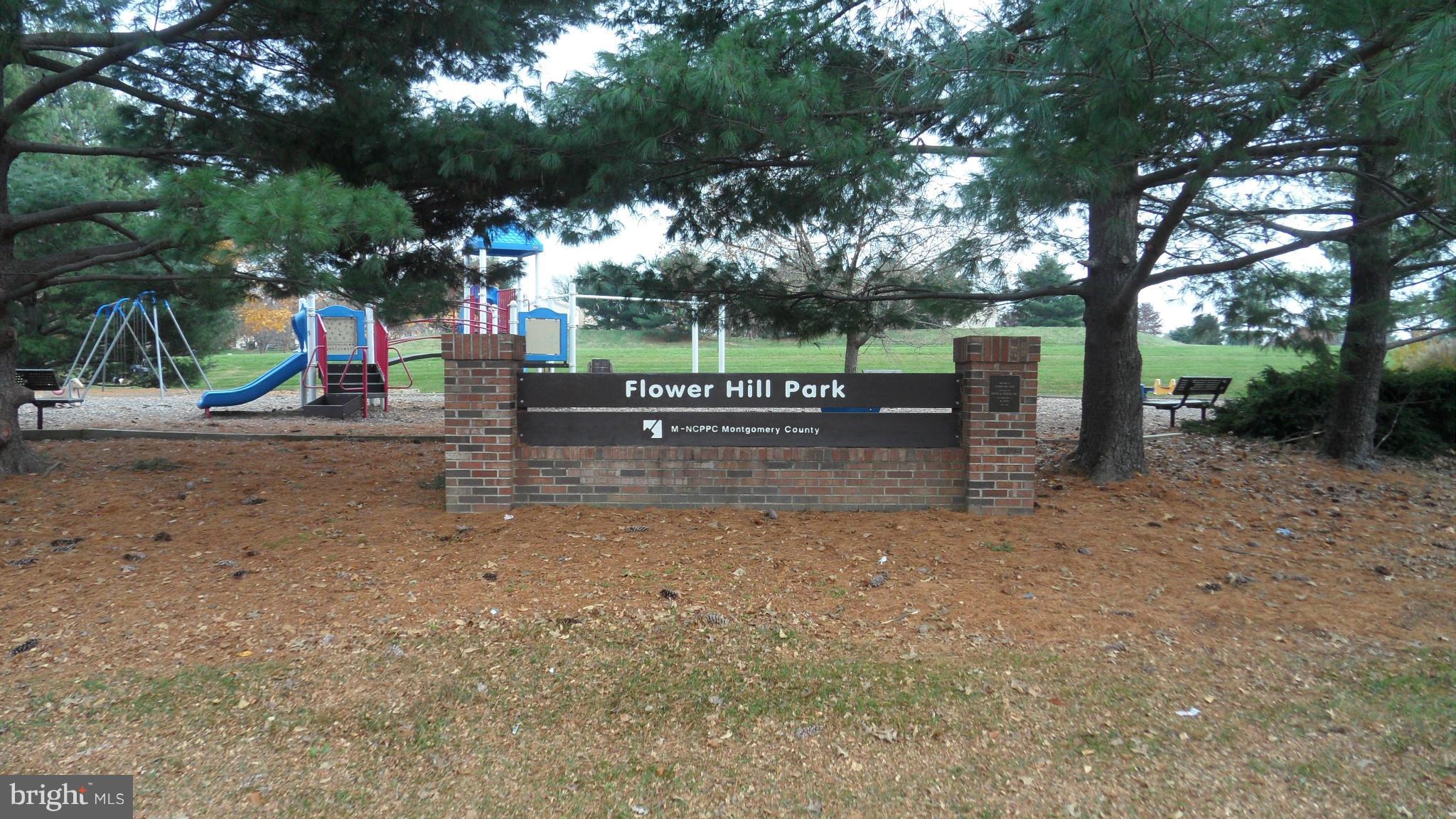 18318 Streamside Drive, Unit 304 Gaithersburg, MD 20879 - Photo 30 of 30 a view of street with trees