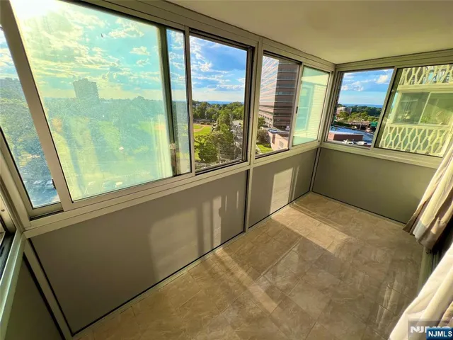 a kitchen with a large window