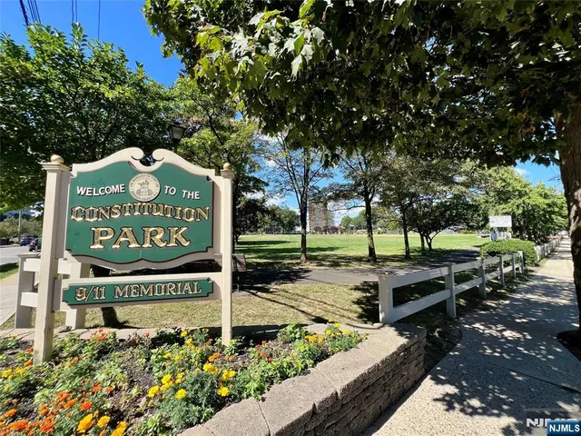 a view of a building with backyard