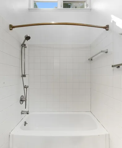 a bathroom with a bathtub