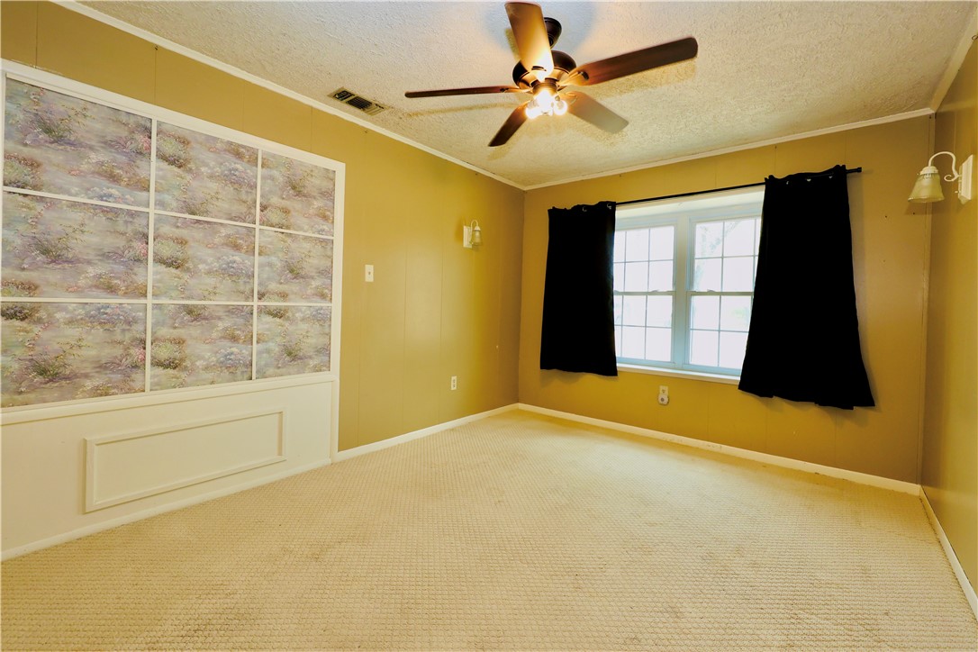 903 McGuill Road Goliad, TX 77963 - Photo 11 of 17 a view of an empty room with a window