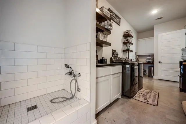 a view of a living room and entryway