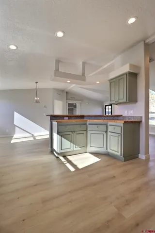 a kitchen with stainless steel appliances granite countertop a cabinets and a sink