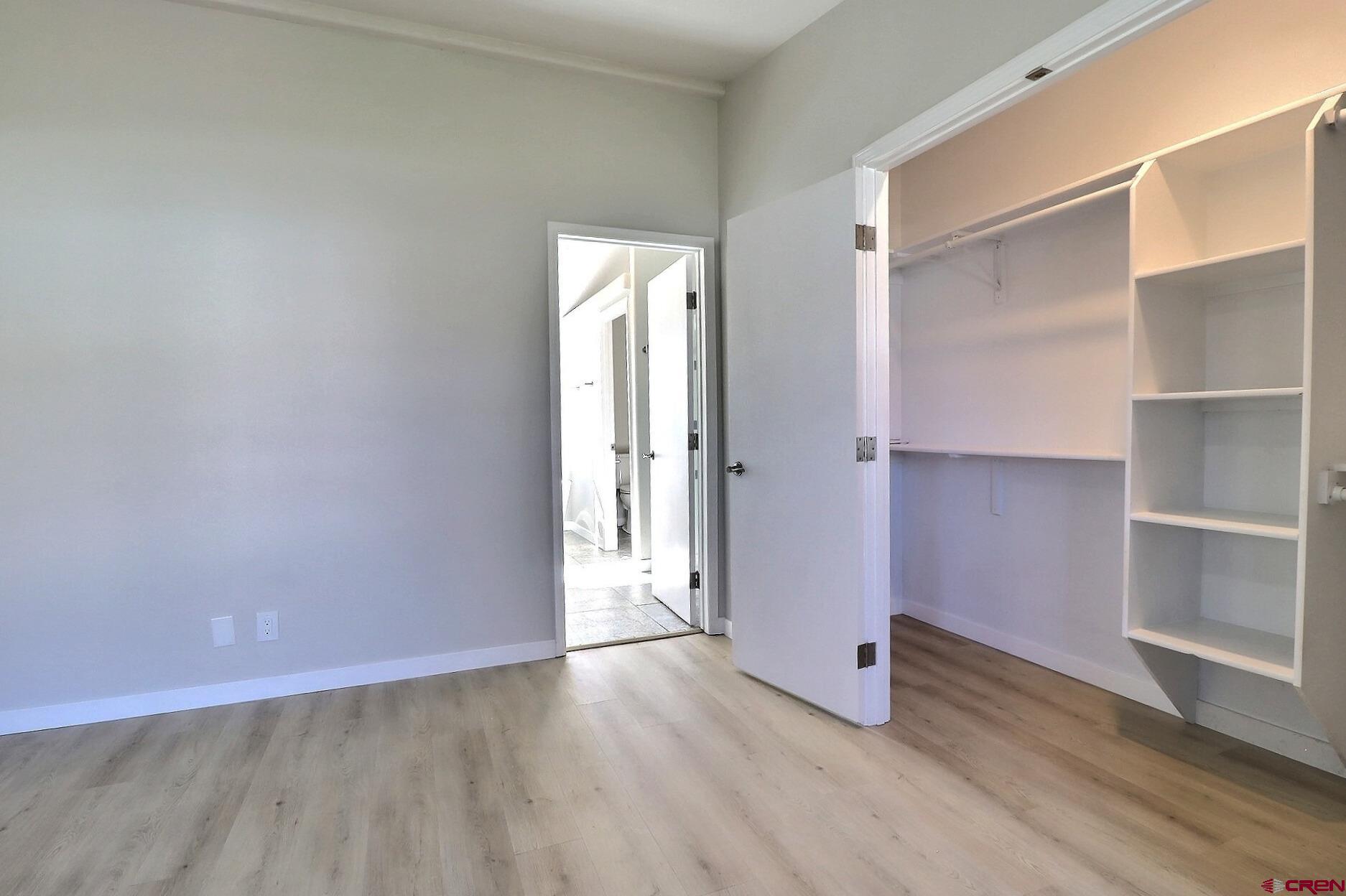 761 Stahl Road Paonia, CO 81428 - Photo 20 of 39 an empty room with wooden floor