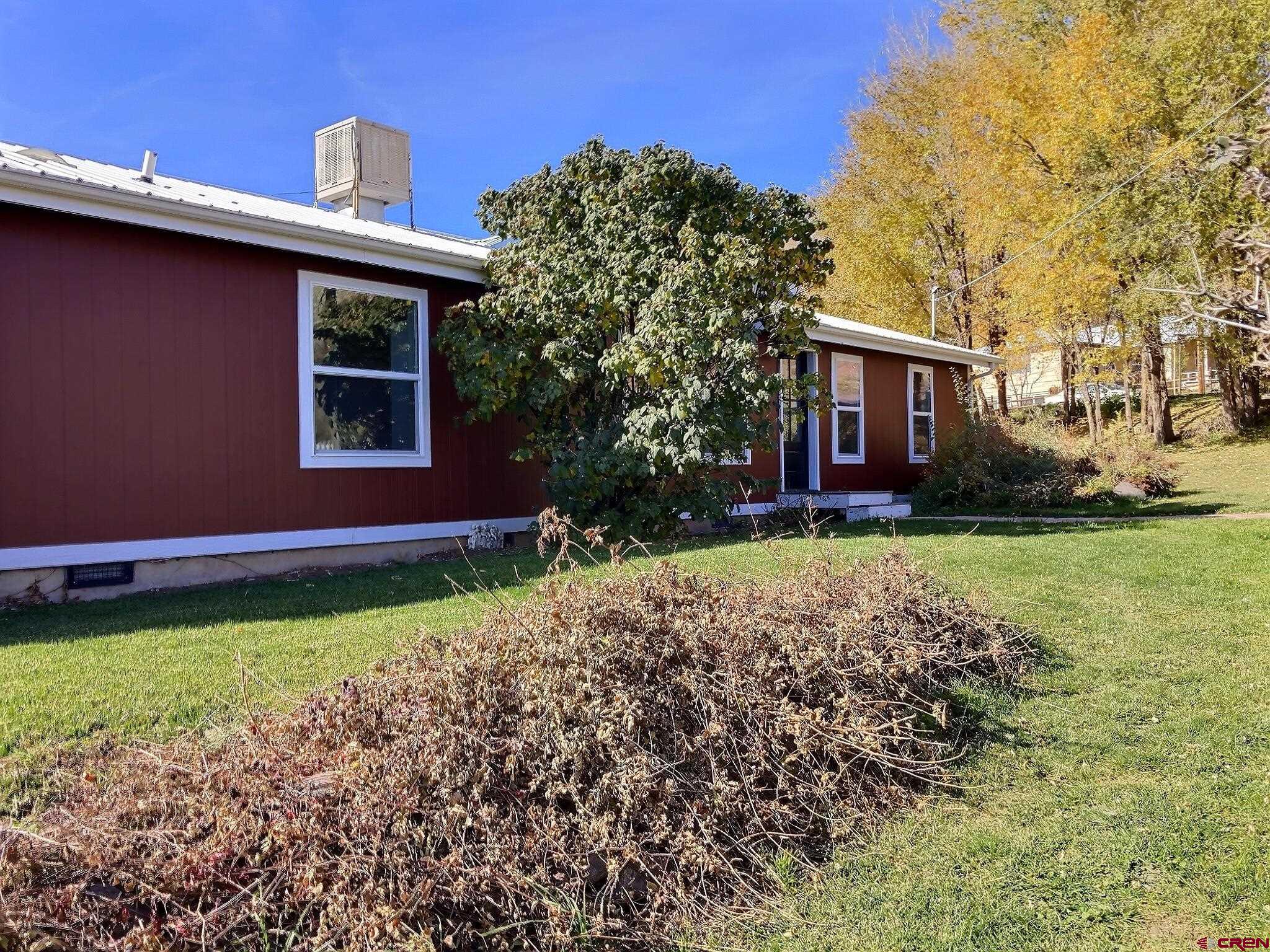 761 Stahl Road Paonia, CO 81428 - Photo 2 of 39 a house with garden in front of it