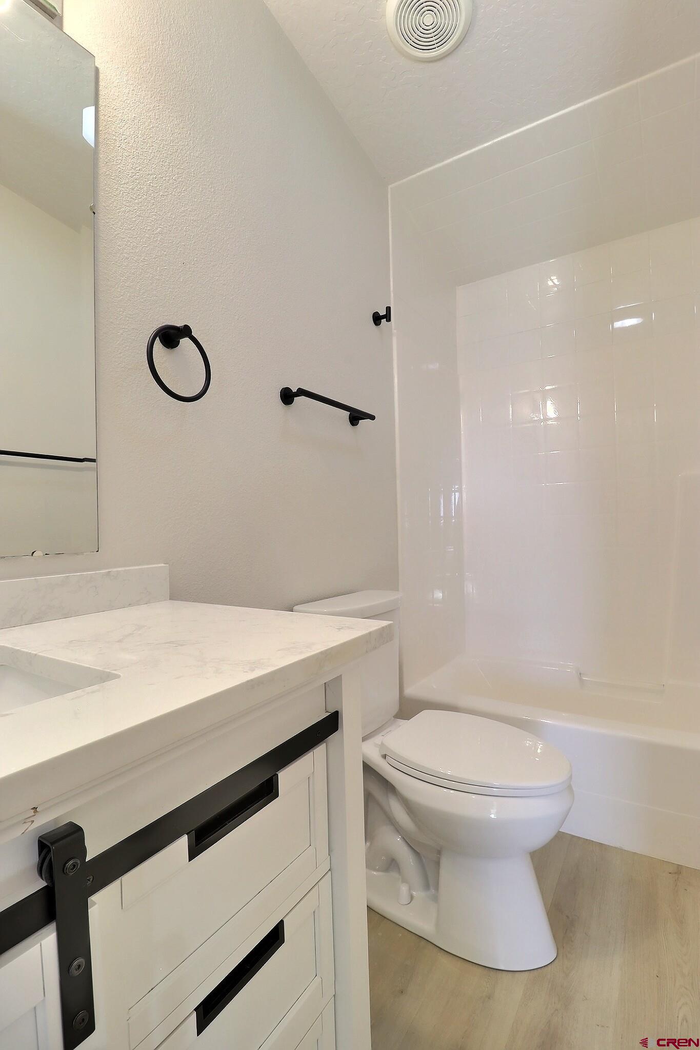 761 Stahl Road Paonia, CO 81428 - Photo 26 of 39 a bathroom with a sink a toilet and a shower