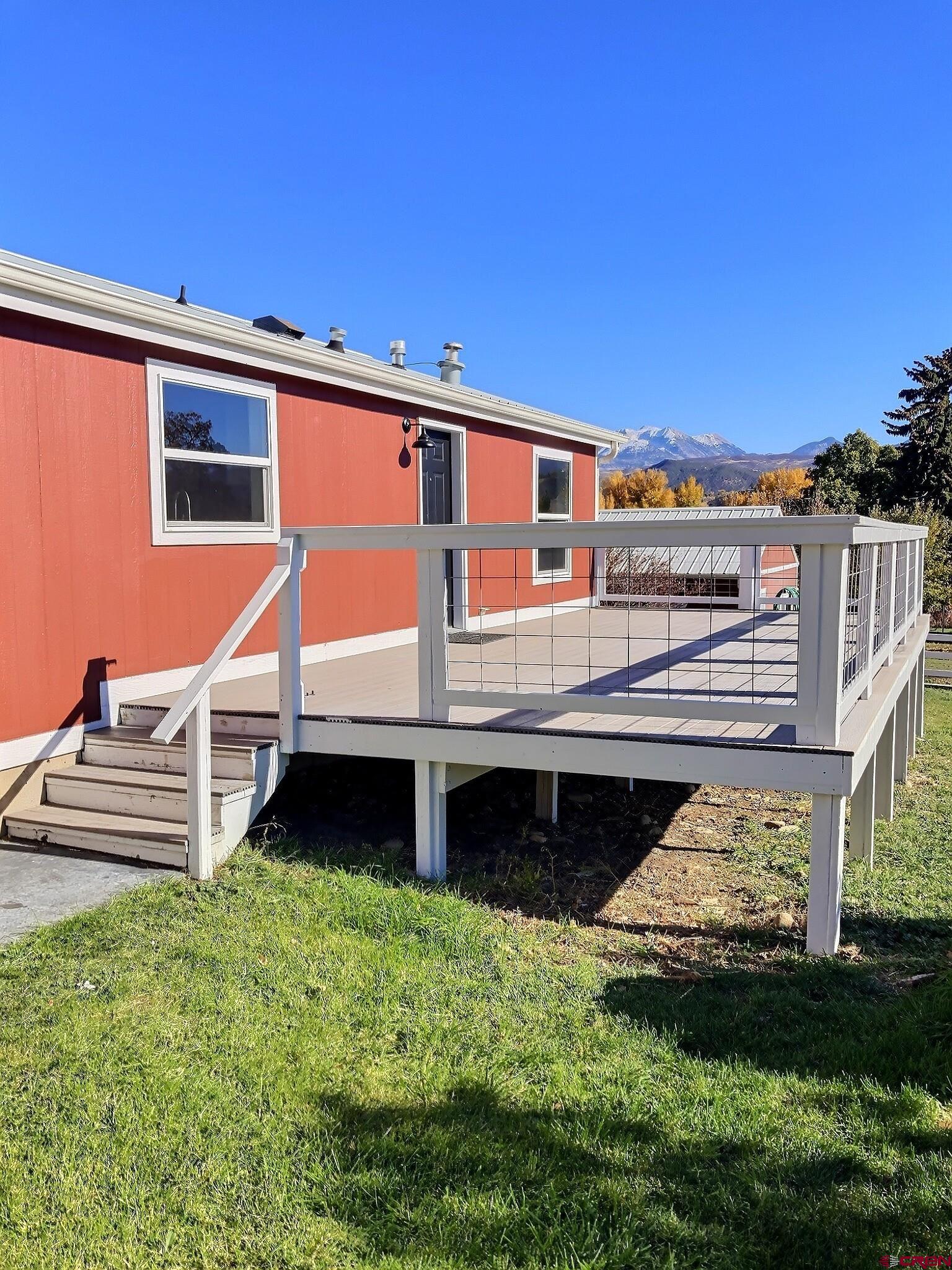 761 Stahl Road Paonia, CO 81428 - Photo 32 of 39 a front view of a house with a yard