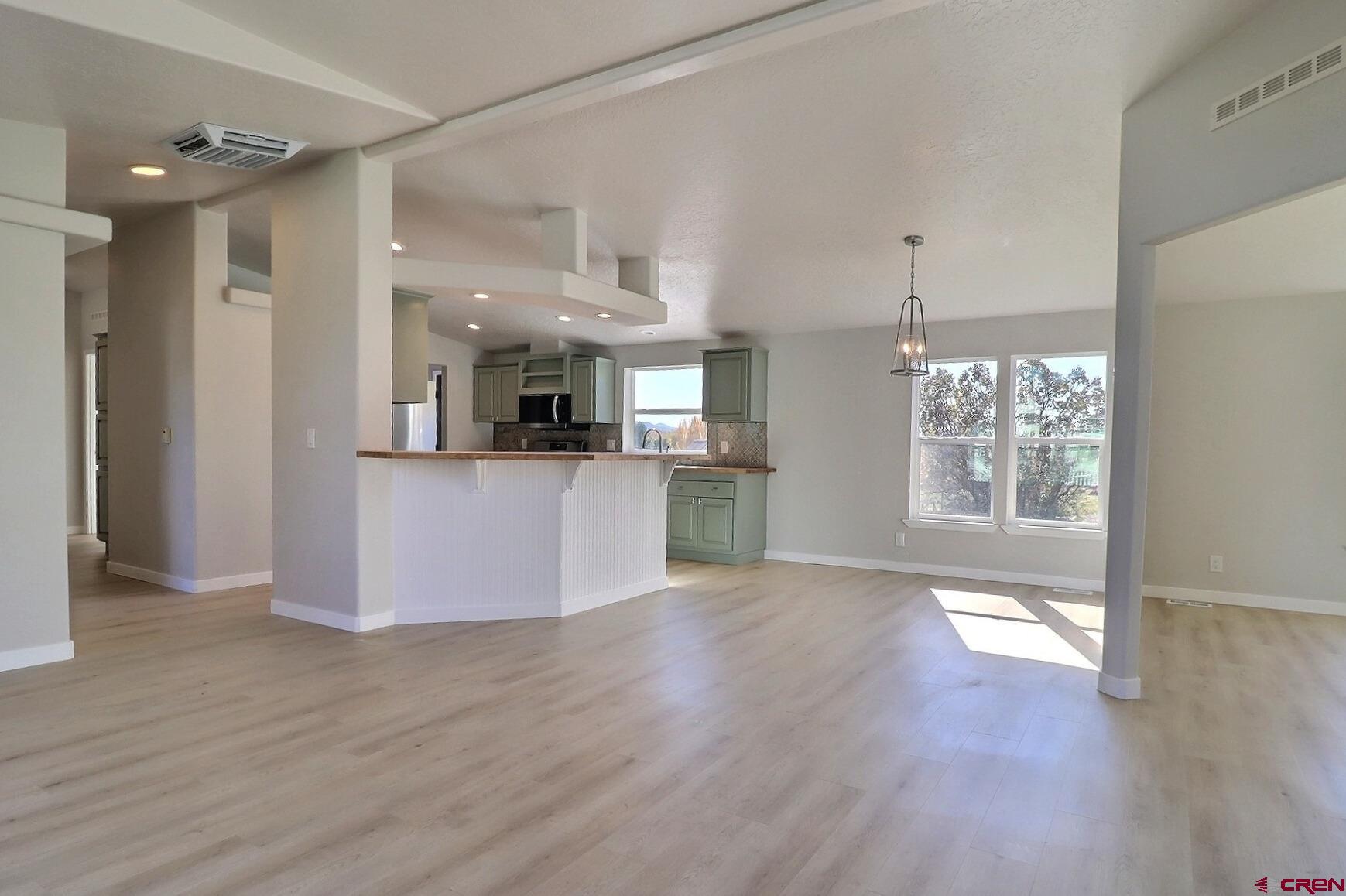 761 Stahl Road Paonia, CO 81428 - Photo 7 of 39 a view of a kitchen cabinets and wooden floor