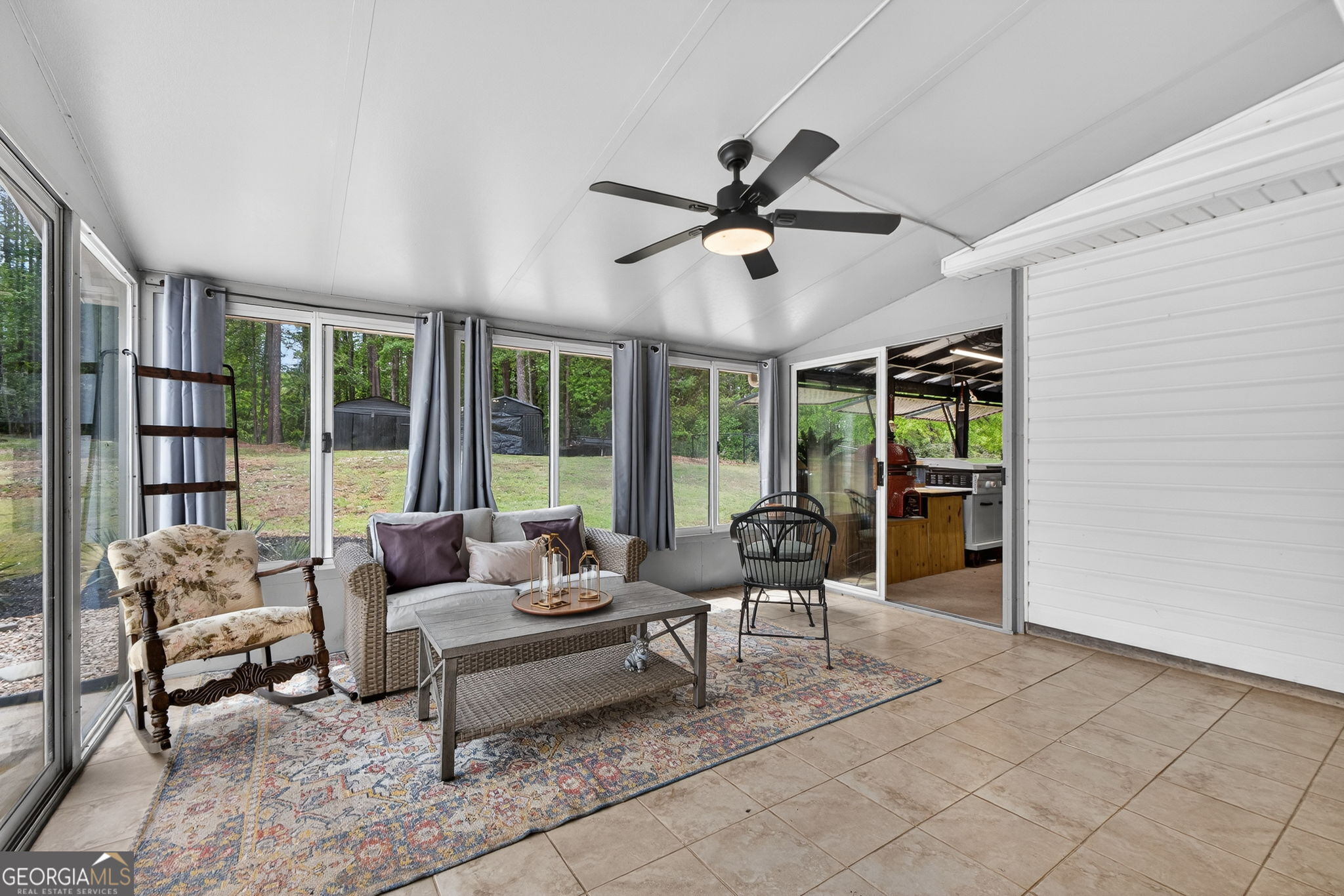 417 Stuarts Lane Locust Grove, GA 30248 - Photo 23 of 48 a living room with furniture and a large window