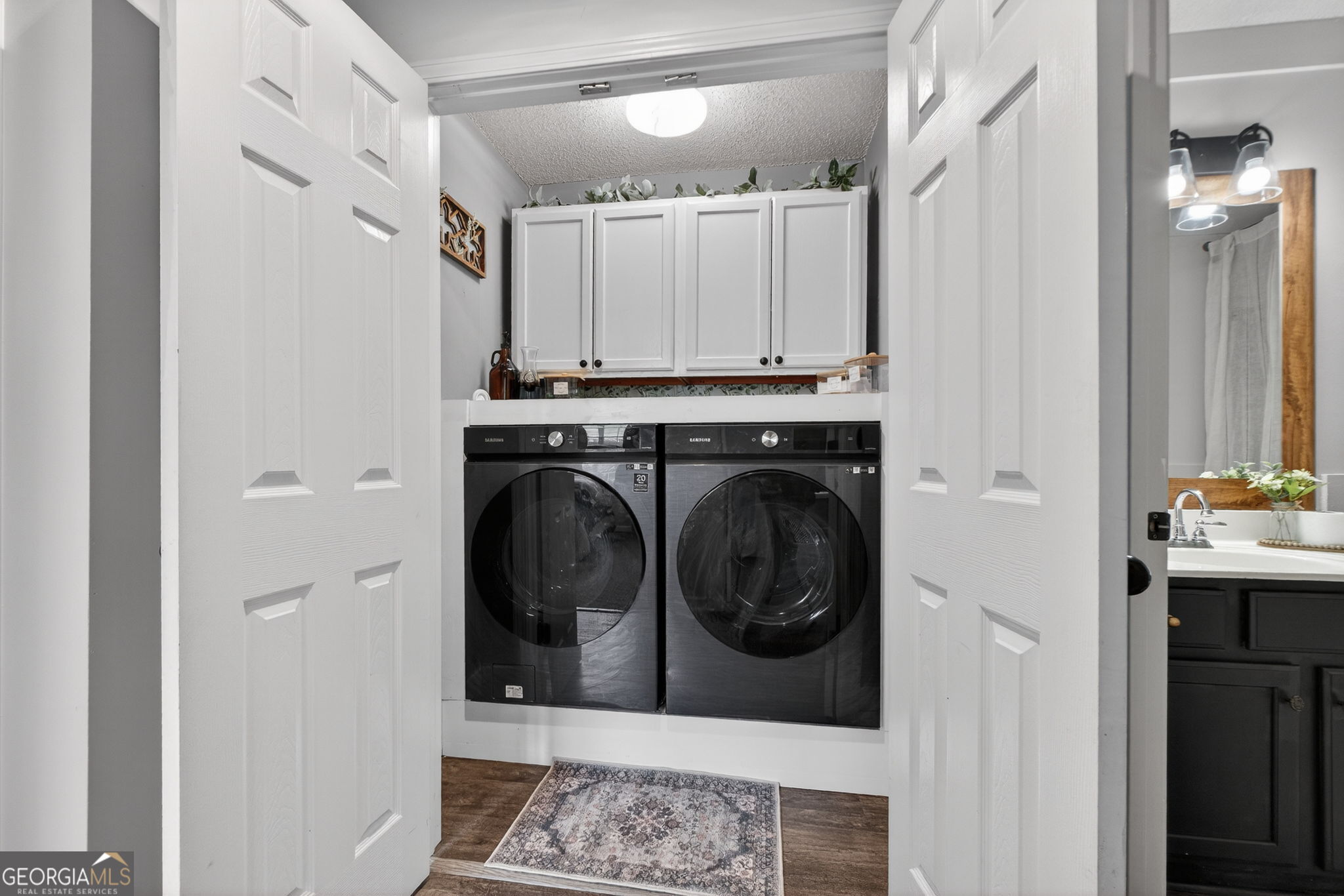 417 Stuarts Lane Locust Grove, GA 30248 - Photo 29 of 48 a bathroom with a sink and a mirror