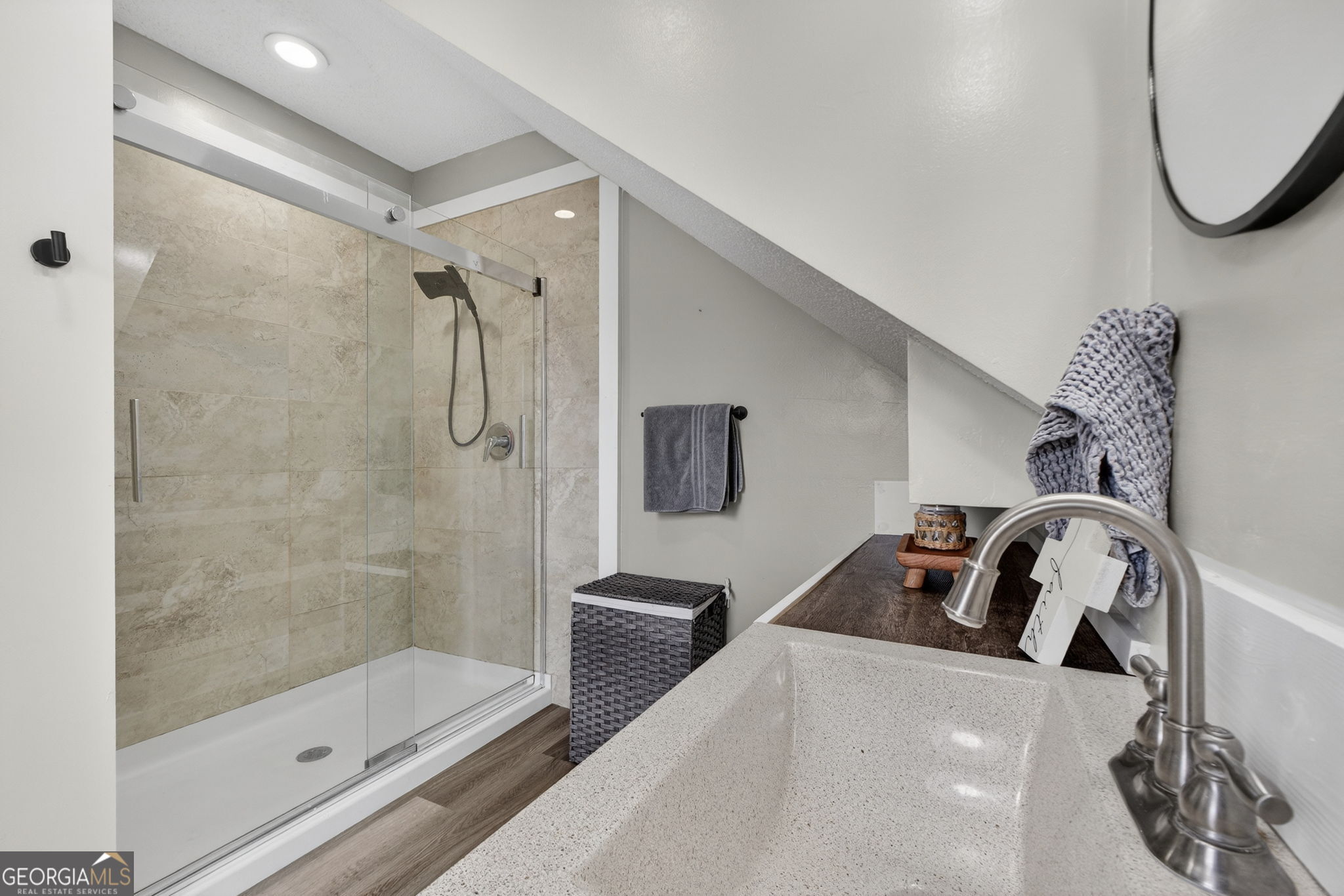 417 Stuarts Lane Locust Grove, GA 30248 - Photo 32 of 48 a bathroom with a tub sink and mirror