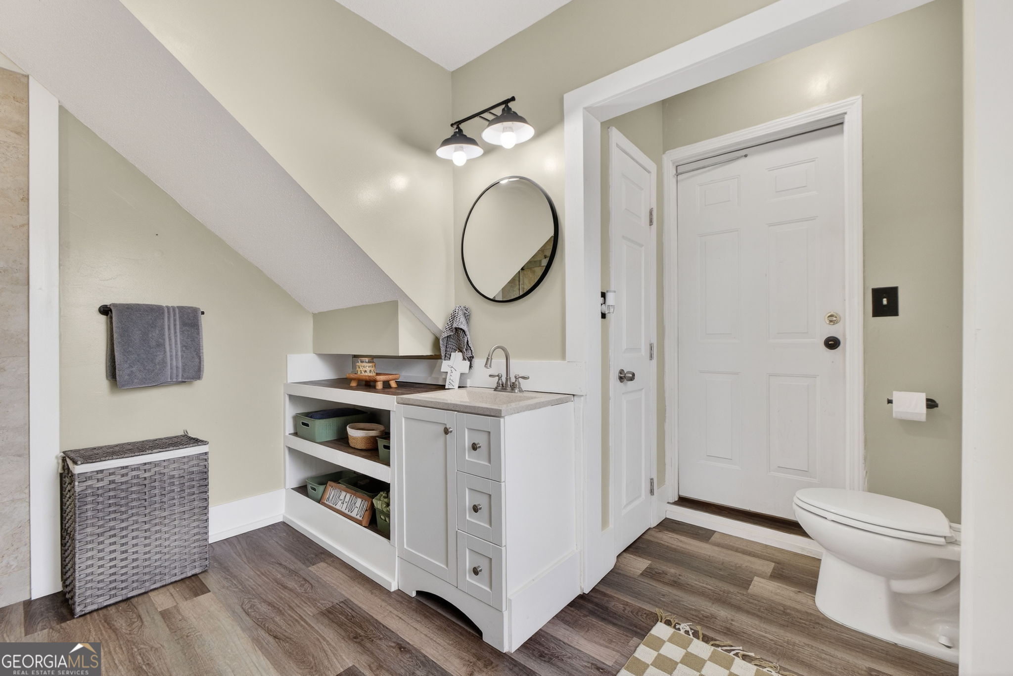 417 Stuarts Lane Locust Grove, GA 30248 - Photo 36 of 48 a spacious bathroom with a toilet a double vanity and a sink