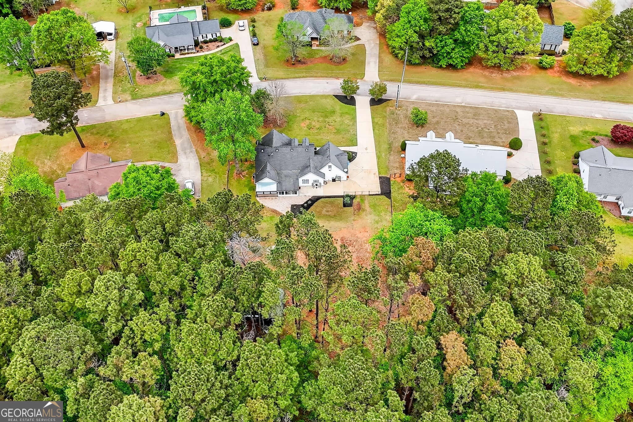 417 Stuarts Lane Locust Grove, GA 30248 - Photo 41 of 48 an aerial view of a residential houses with yard