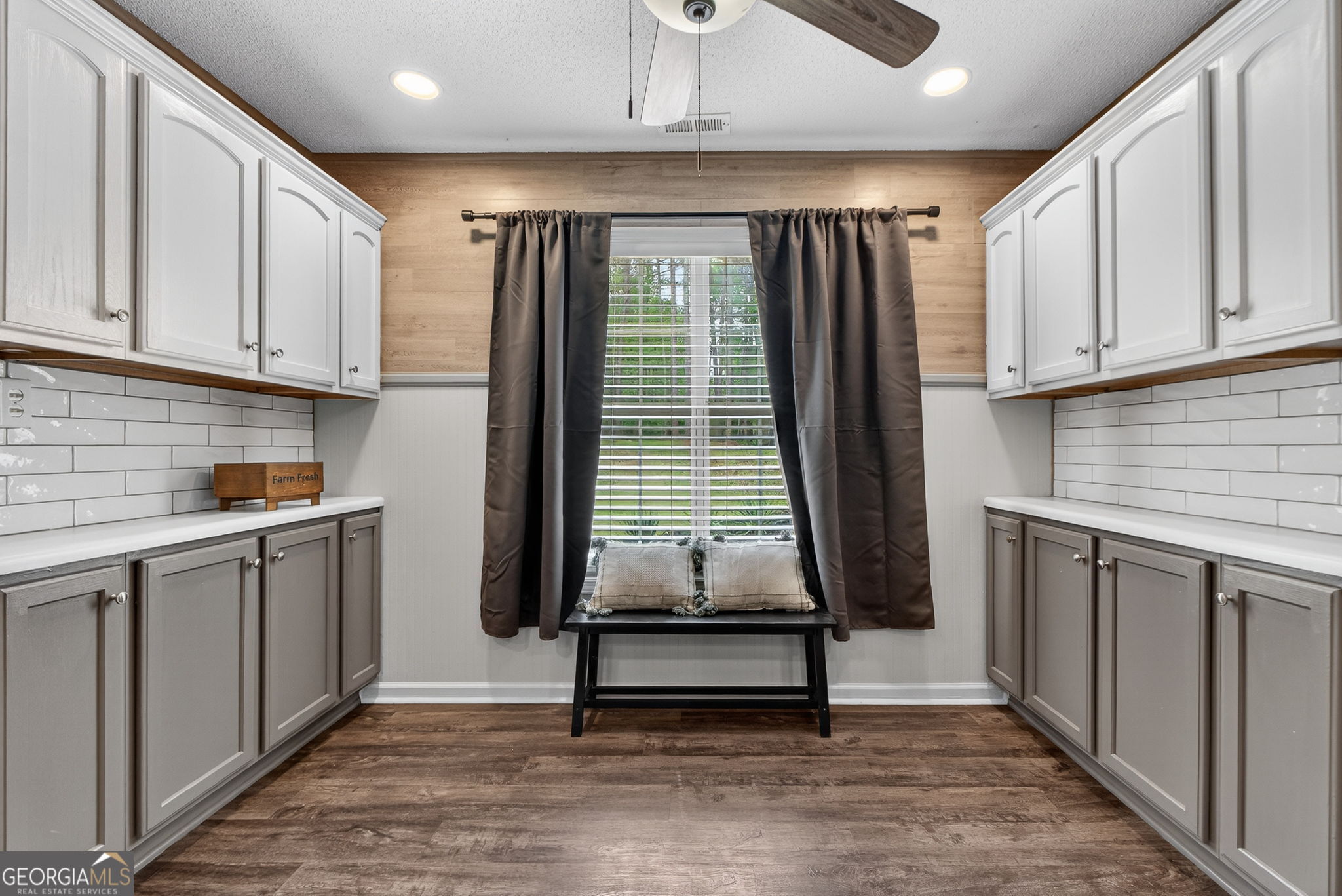 417 Stuarts Lane Locust Grove, GA 30248 - Photo 7 of 48 a kitchen with kitchen island granite countertop a refrigerator and a sink