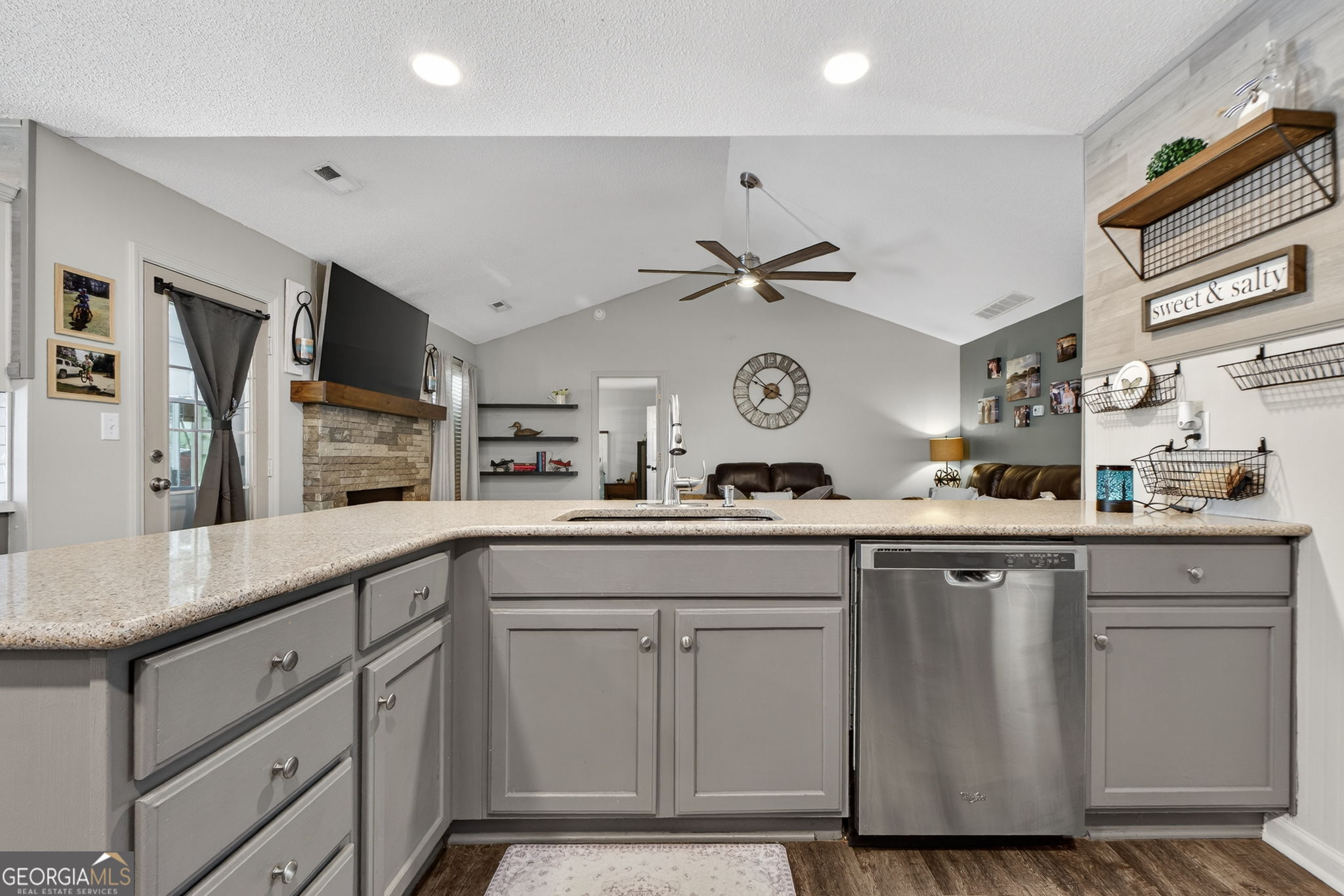 417 Stuarts Lane Locust Grove, GA 30248 - Photo 10 of 48 a kitchen with cabinets a sink and stainless steel appliances