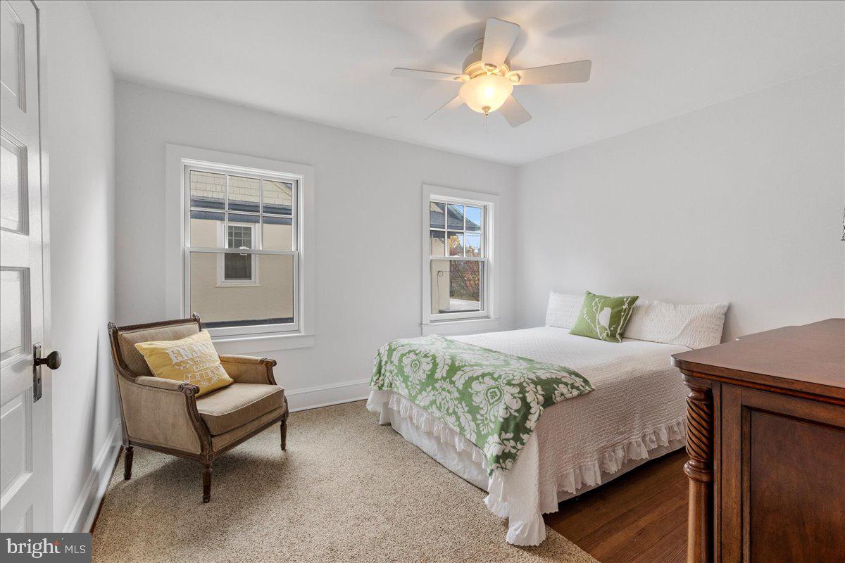 29 Jefferson Road Princeton, NJ 08540 - Photo 17 of 24 a bedroom with a bed couch and a window