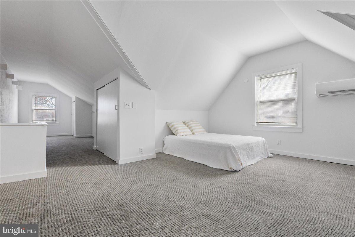 29 Jefferson Road Princeton, NJ 08540 - Photo 21 of 24 a spacious bedroom with a bed and a cabinets