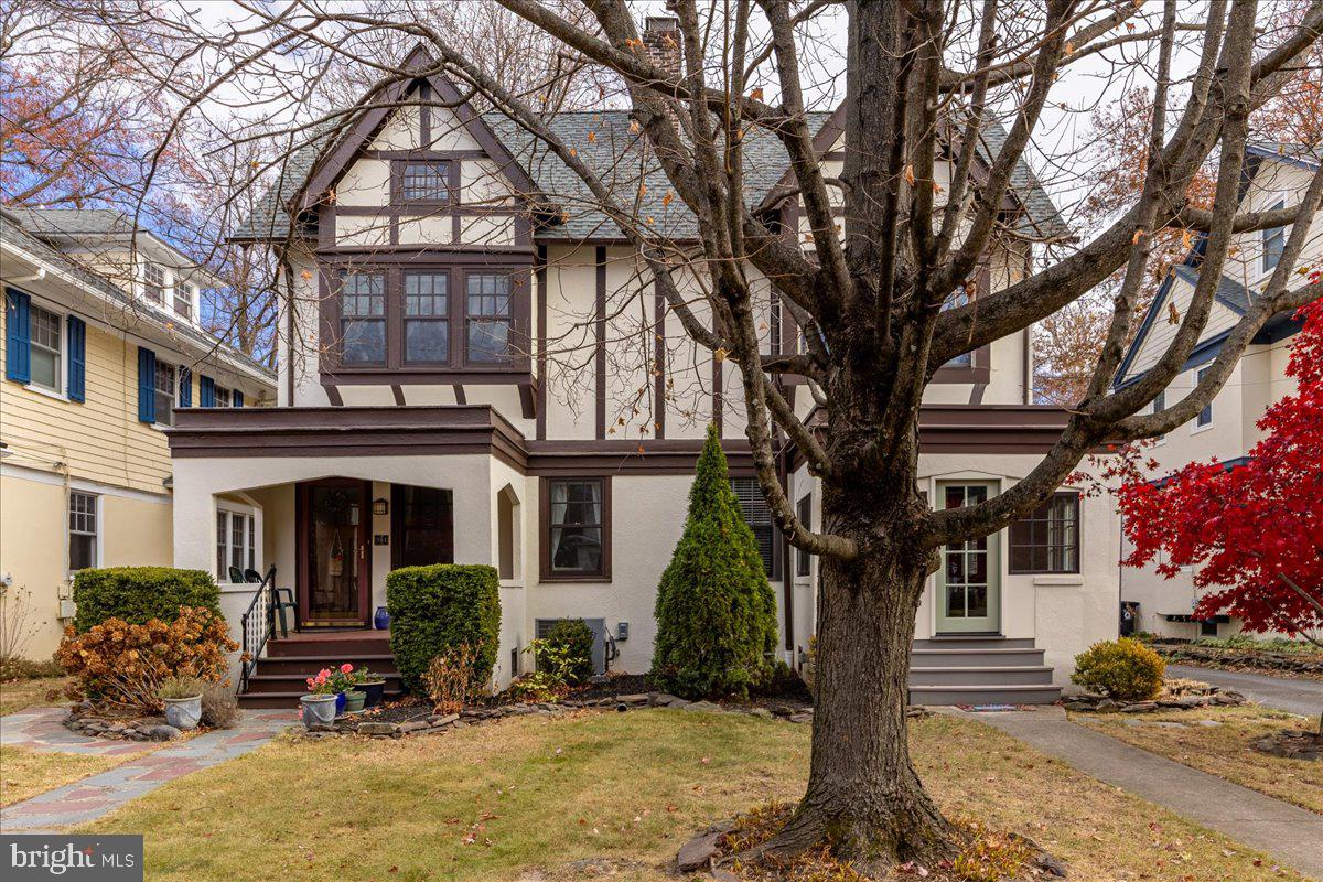 29 Jefferson Road Princeton, NJ 08540 - Photo 3 of 24 a front view of a house with garden and trees
