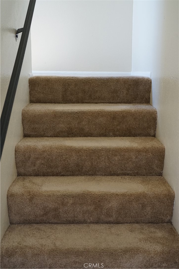 9090 Colony Place, Unit D Riverside, CA 92503 - Photo 3 of 24 a close view of flowerpot and rug