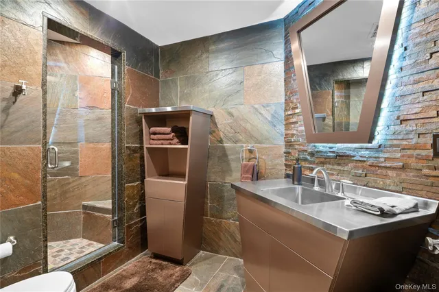 a view of a livingroom with wooden floor and closet