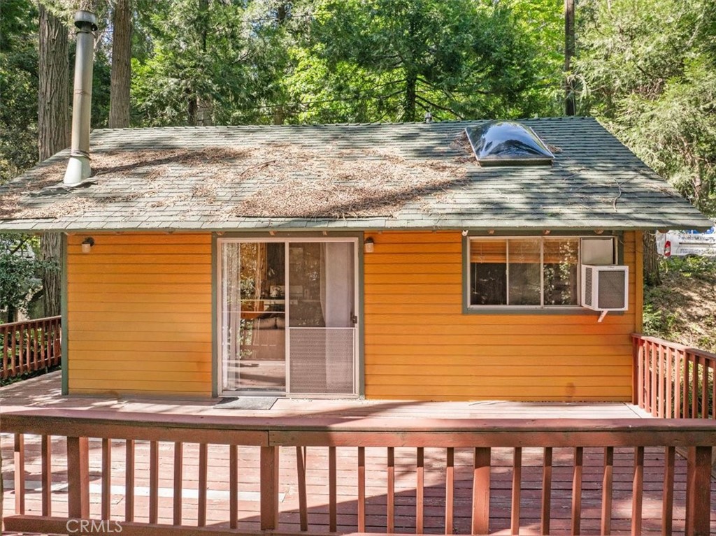 697 Mormon Springs Road Crestline, CA 92325 - Photo 27 of 37 a view of a house with a yard