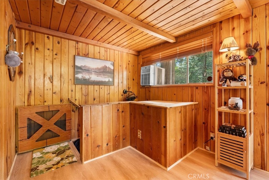 697 Mormon Springs Road Crestline, CA 92325 - Photo 10 of 37 a view of a room with racks on the wall