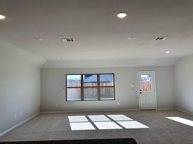 an empty room with windows