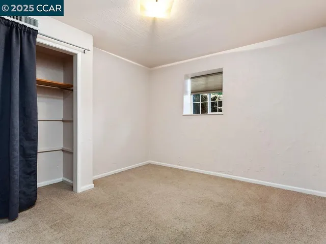 an empty room with closet