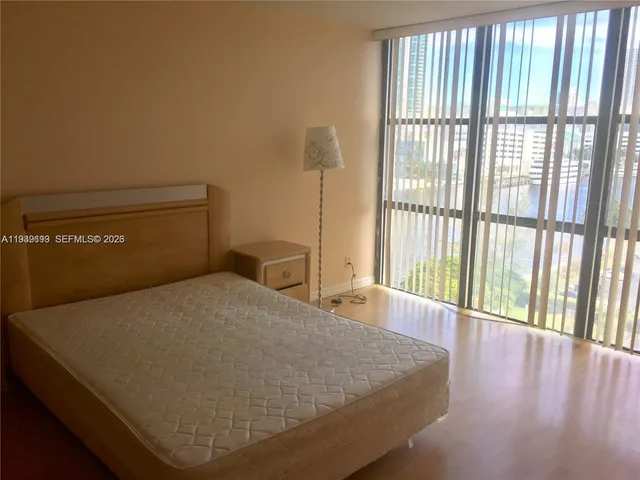 a view of a city with tall buildings