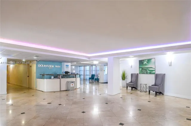 a view of swimming pool of water with palm trees