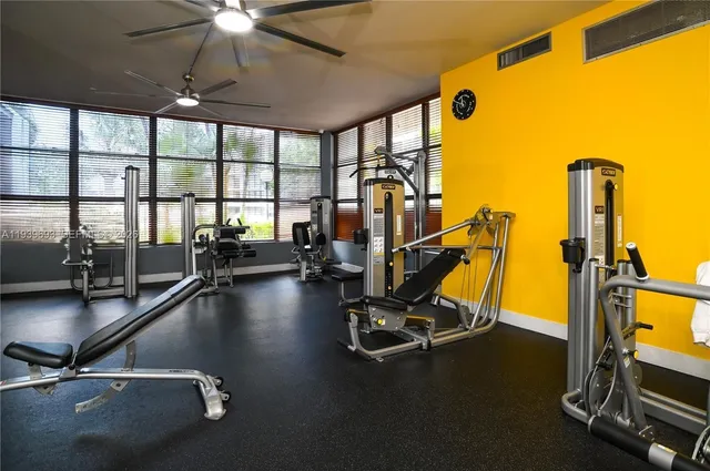 a aerial view of multiple houses with a yard