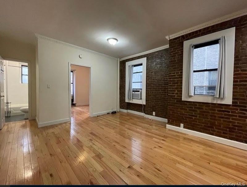 21-06 35th Street, Unit C3 Queens, NY 11105 - Photo 3 of 7 Living