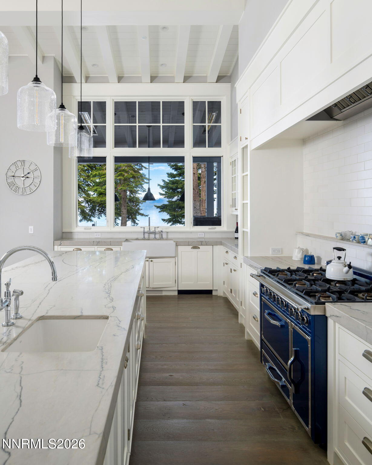 226 4 Ring Road Tahoma, CA 96142 - Photo 15 of 41 a kitchen with a stove a sink and a window