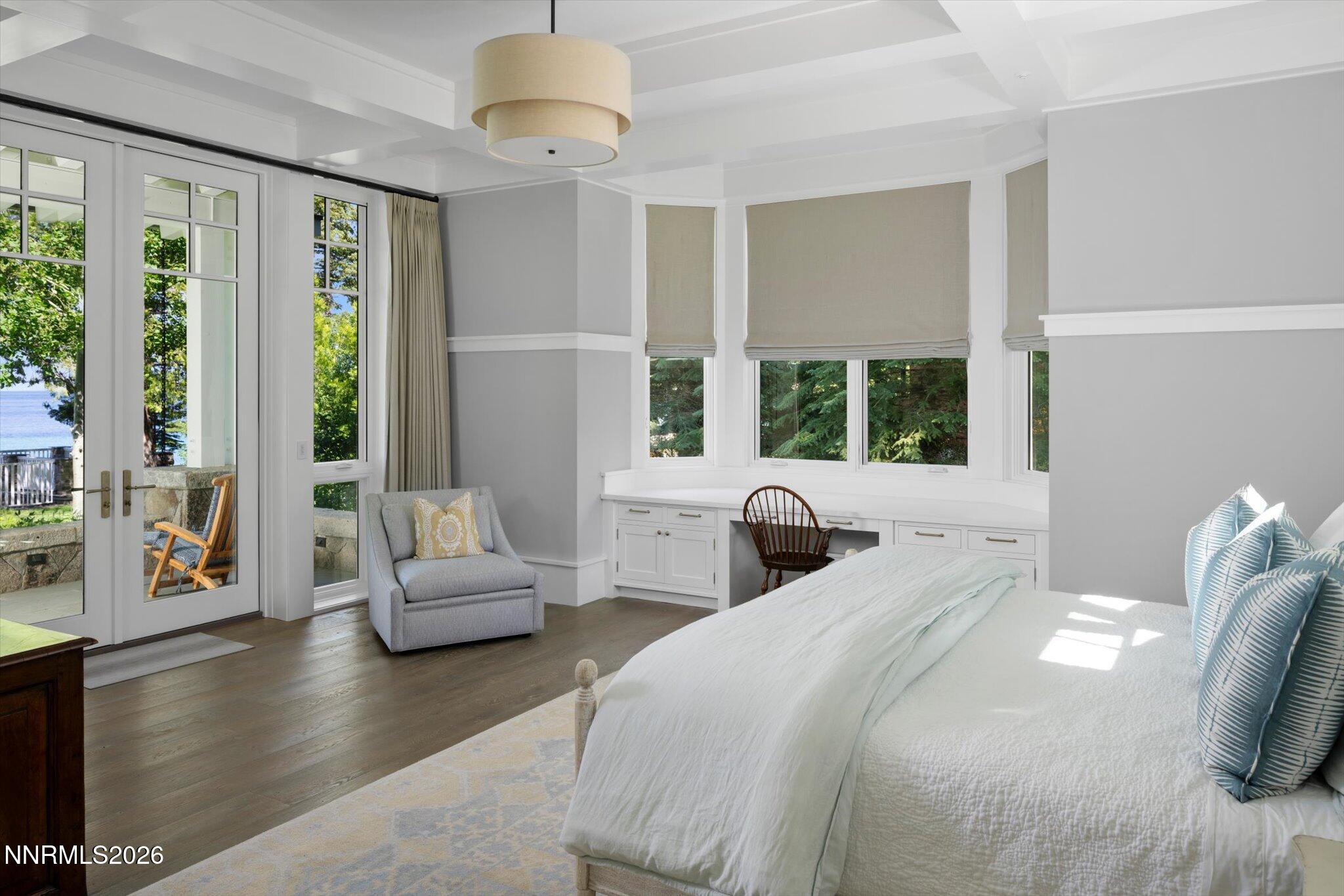 226 4 Ring Road Tahoma, CA 96142 - Photo 23 of 41 a bedroom with a large bed and a large window